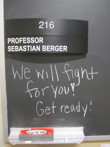 A message on the blackboard outside of Prof. Berger’s Althouse office.