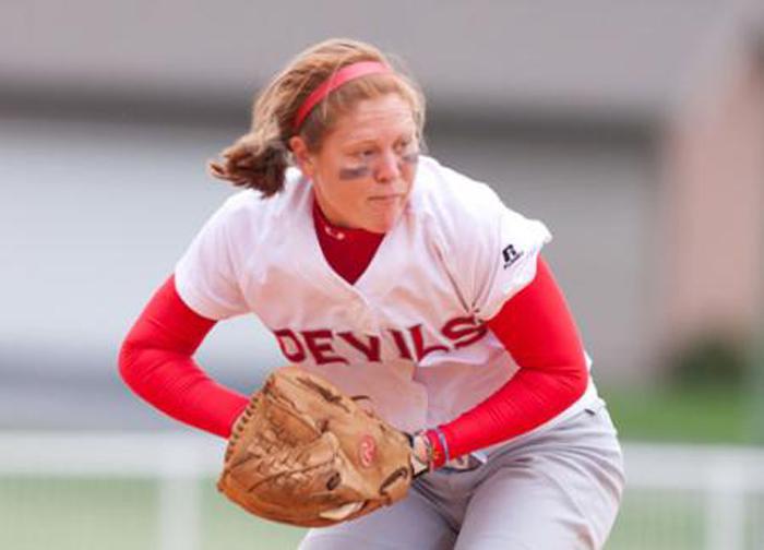 Shortstop Melissa Osborn ’13, pictured above making a play, went 2-3 in the first game of the season. 