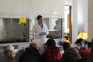 Aaron Cook '15 teaches boy scouts chemistry fundamentals.