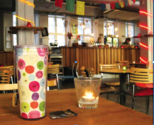 On a morning coffee date with a friend before classes, the environment is very hyggelig with candles, soft lighting, warm drinks, relaxing music, and welcoming company.