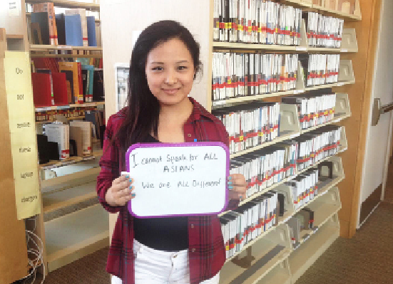 Tsering Sherpa ’16 poses for the Sigma Lambda Gamma photo project “I Too Am Dickinson.”