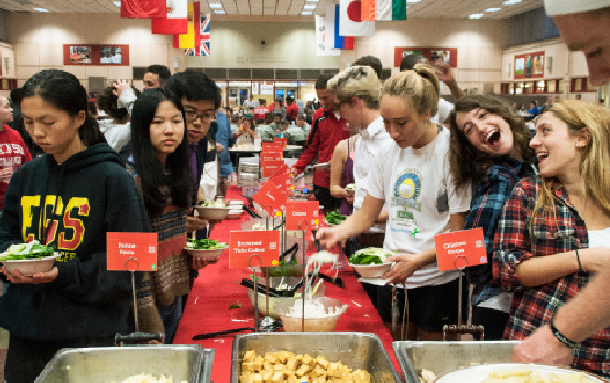 Students line up to be served at Dickinsons first Farm Fresh Fare dinne, where they at organic food from the Dickinson College Farm.