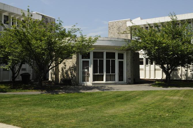 Kisner-Woodward dorm. The circular lobby contains the gender-neutral mechanical bathroom with the rooms in the towers on either side.