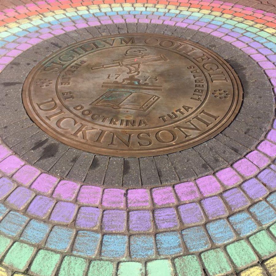 The seal on Britton Plaza was colored decoratively with chalk in support of National Coming Out Day.