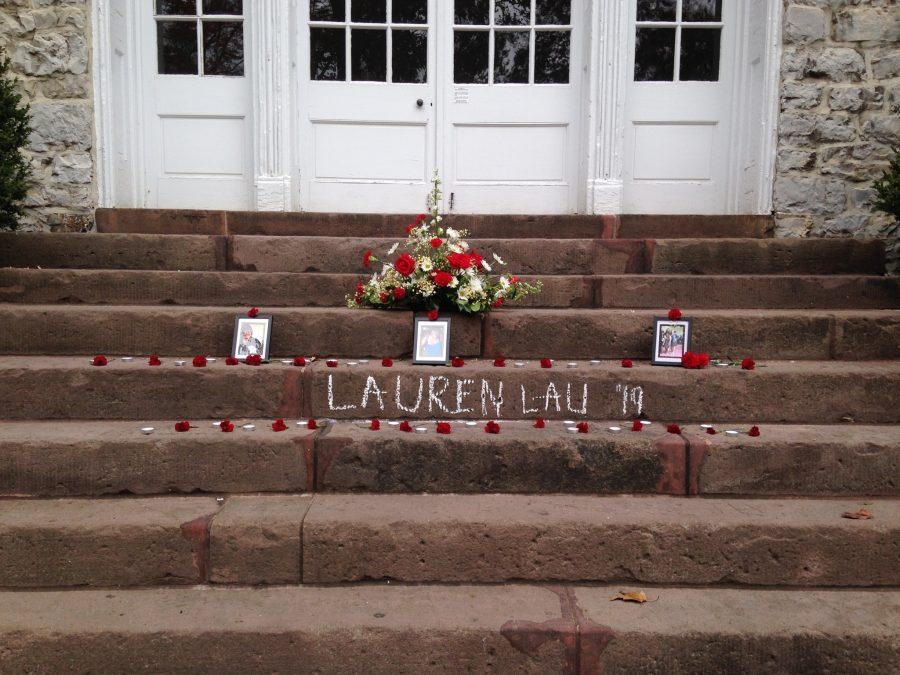 A display for Lau on the steps of Old West.