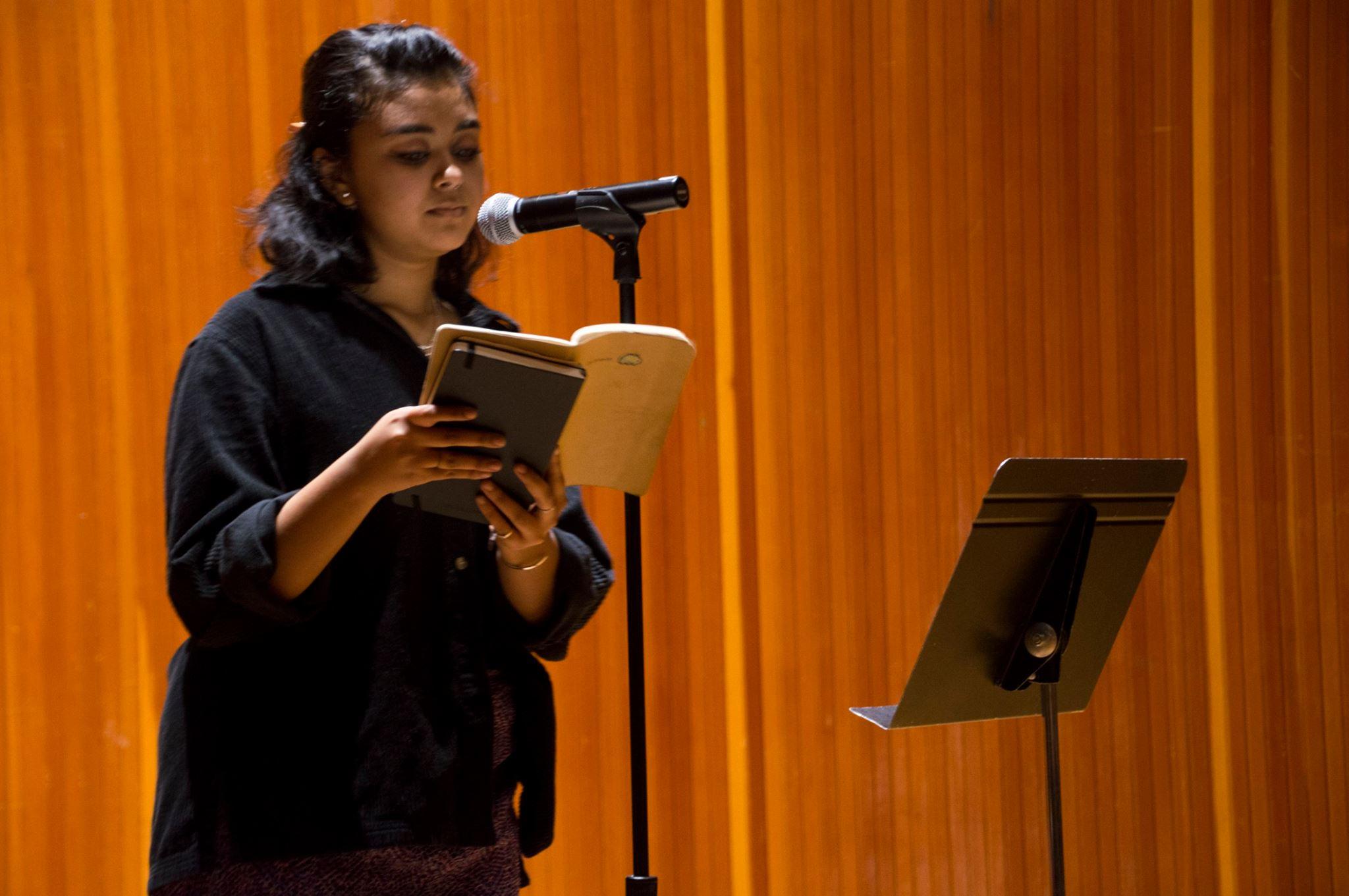 Student poets and members of Dickinson’s poetry club “eXiled” Hayat Rasul ’19 opened the performance.
