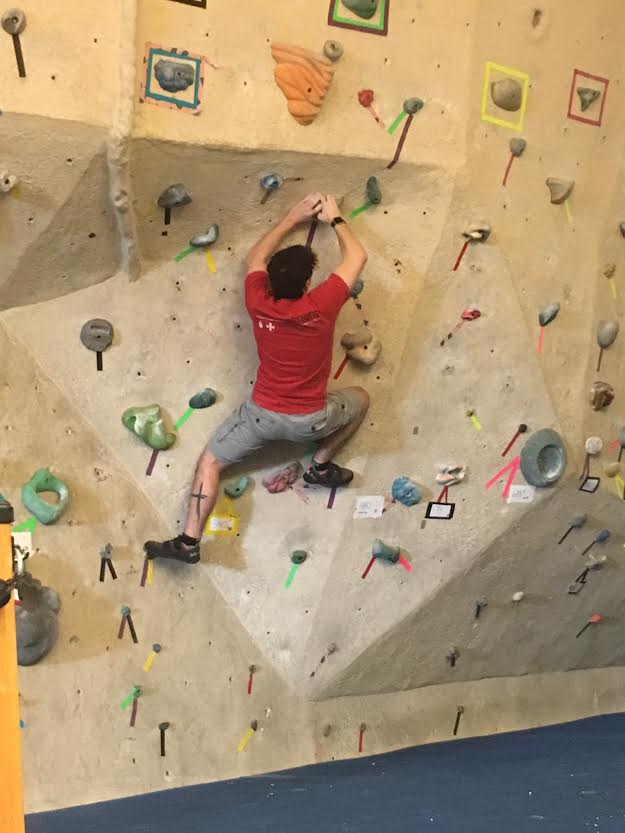 A+student+tries+his+luck+at+the+climbing+wall.