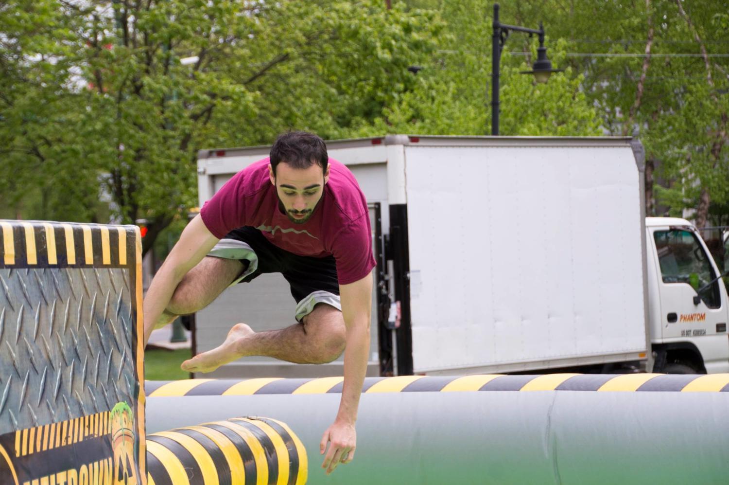 Jacob Costello ’19 enjoys one of the inflatables that was featured at Springfest.