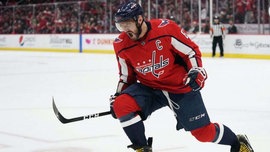 WASHINGTON, DC - JANUARY 13: Alex Ovechkin #8 of the Washington Capitals celebrates after scoring his first goal of the game against the Carolina Hurricanes in the first period at Capital One Arena on January 13, 2020 in Washington, DC. (Photo by Patrick McDermott/NHLI via Getty Images)