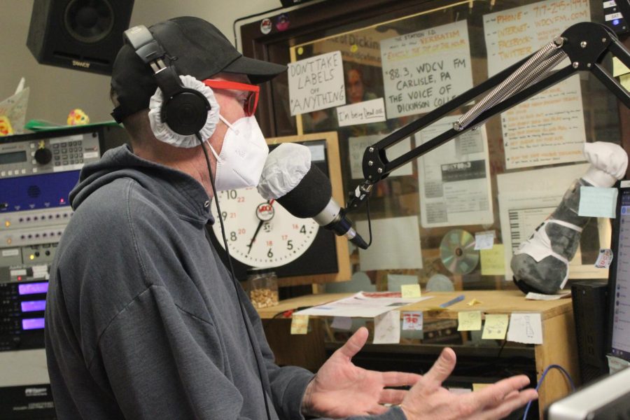 Chuck “Capital C” Adler freestyle rapping during his show, “The Capital C Show” (Photo Courtesy of Walker Kmetz ’25)
